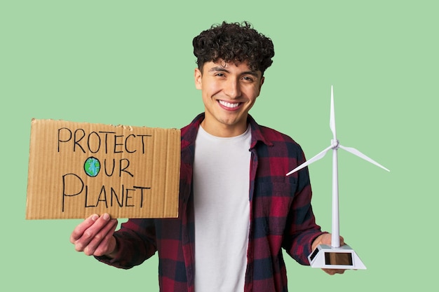 A person happily holding a significantly lower electricity bill, showcasing the savings from the green tariff flag.