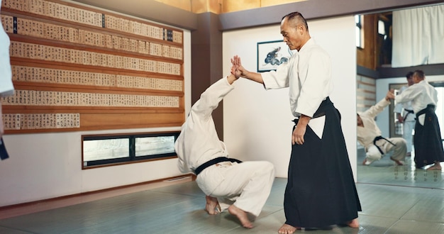 A detailed shot of a judoka executing a perfect Ippon Seoi Nage, showcasing the technique's precision and balance.