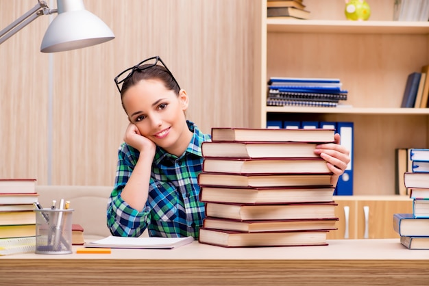 A student sitting at a desk with a focused expression, surrounded by textbooks and study materials, highlighting key dates on a calendar with a marker. The scene conveys diligence and preparation for the ENEM.